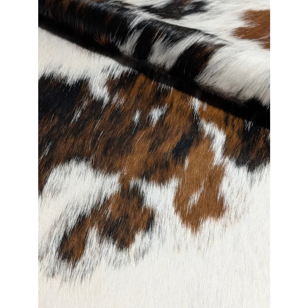 Extra large Tricolor#340 cowhide rug with brown, black, white patches