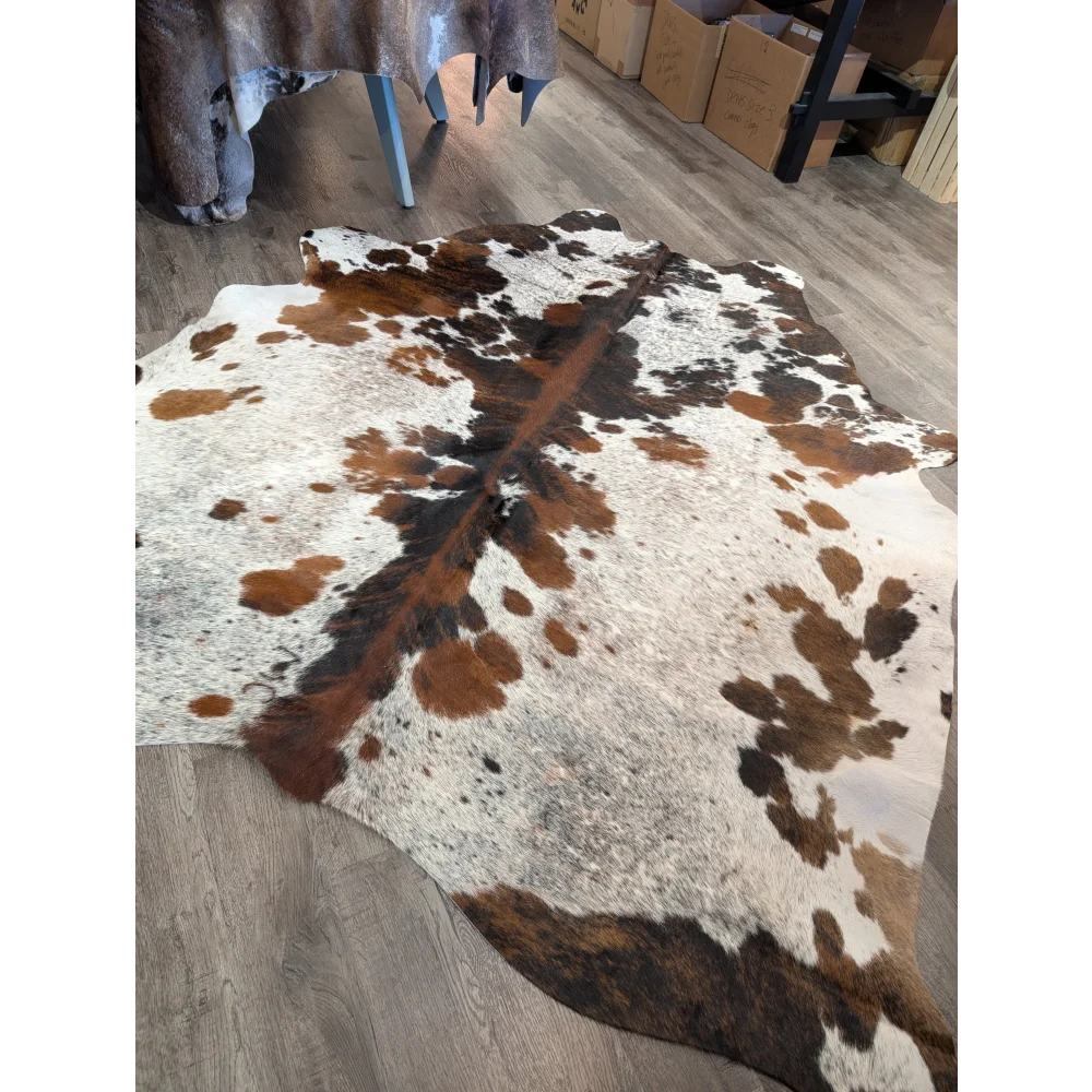 Extra large cowhide rug tricolour#101 with rustic charm in white brown and black spotted unique characteristics