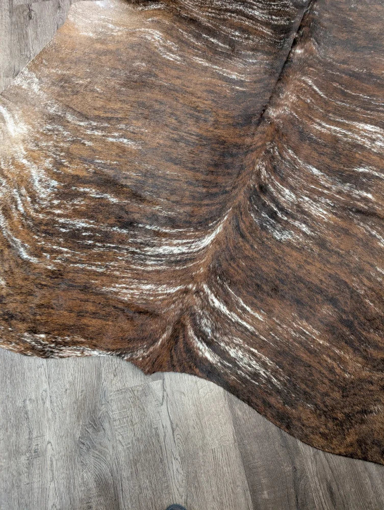 Brown and white extra large cowhide rug tricolour117 with natural textured patterns and rustic charm unique characteristics