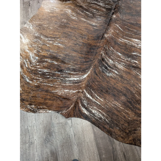 Brown and white extra large cowhide rug tricolour117 with natural textured patterns and rustic charm unique characteristics
