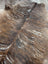 Brown and white extra large cowhide rug with rustic charm and unique natural irregular edges tricolour117 90 x 82 inches