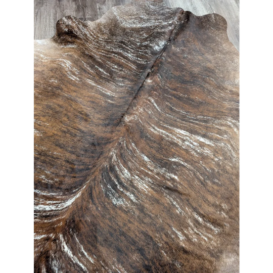 Brown and white extra large cowhide rug with rustic charm and unique natural irregular edges tricolour117 90 x 82 inches