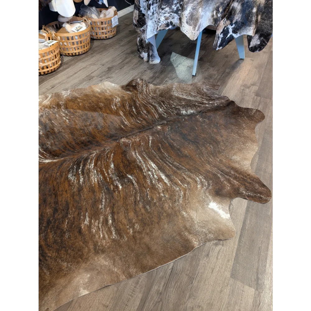 Tricolour 117 extra large brown and white cowhide rug with rustic charm and unique characteristics natural edges