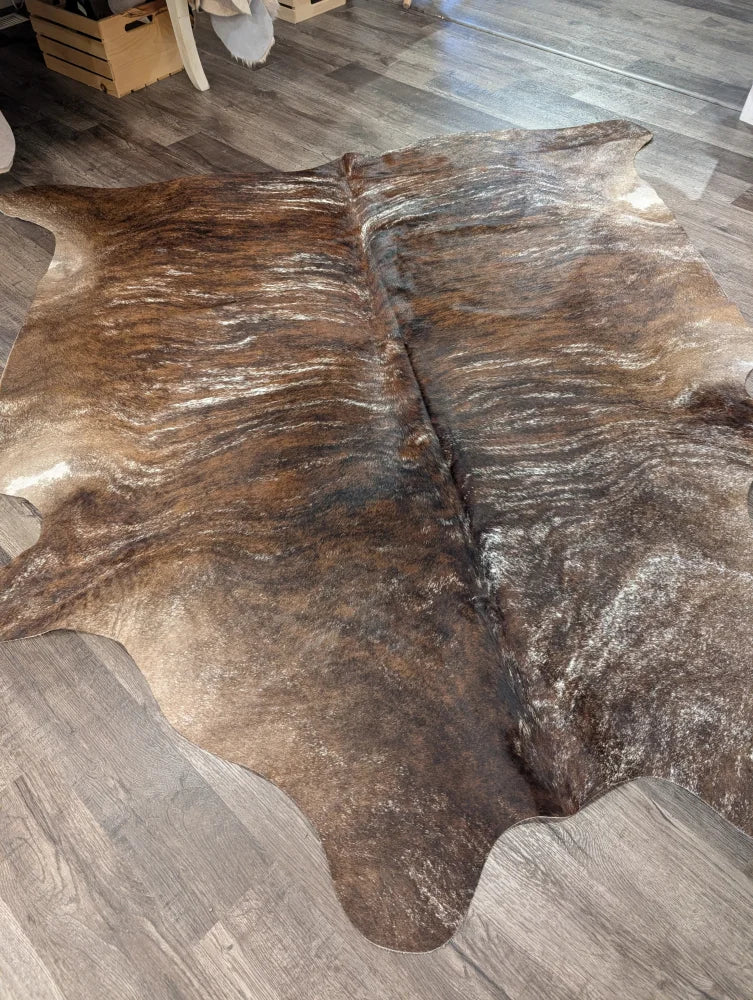 Brown and black extra large cowhide rug tricolour 117 with rustic charm and unique textured patterns