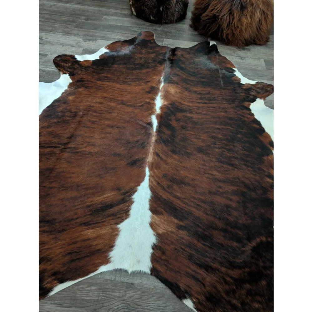 Brown and white tricolour16 extra large cowhide rug with natural fur texture measuring 86 by 82 inches