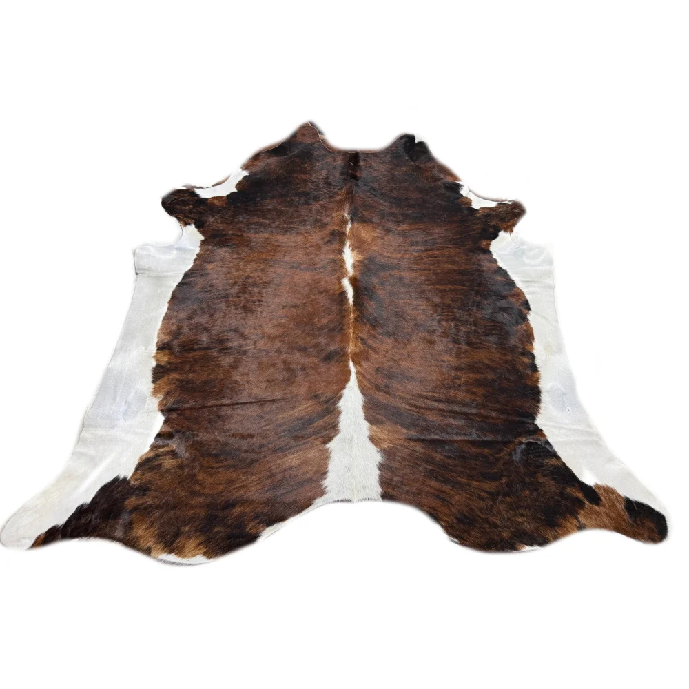 Brown and white tricolour extra large cowhide rug with natural fur texture perfect for beautiful rugs decor