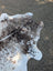 Large cowhide rug tricolour 171 with white and brown spots and natural edge for rustic charm and unique characteristics
