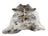 A large cowhide rug with unique characteristics featuring a beautiful tricolour white and dark gray speckled pattern