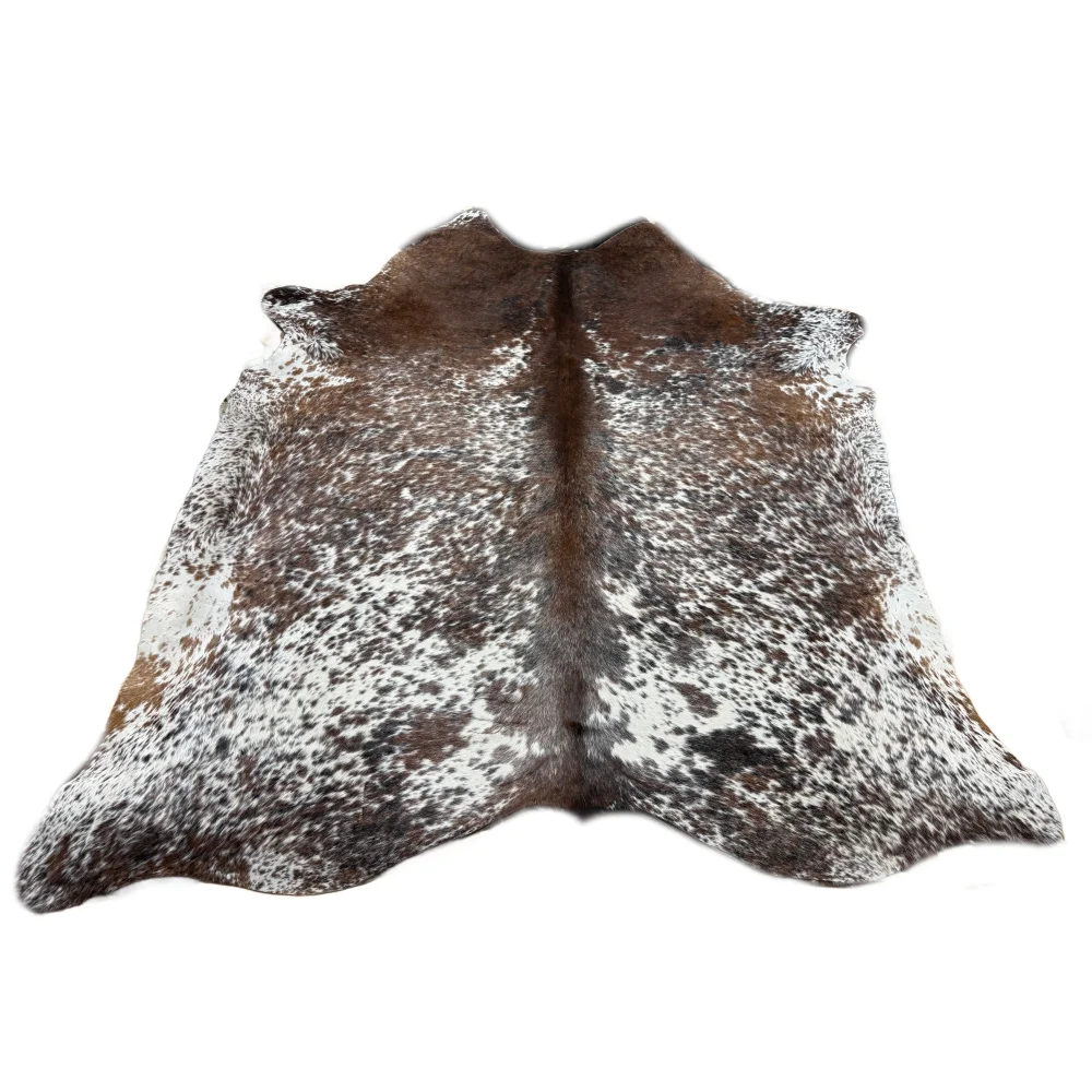 Extra large brown and white speckled cowhide rug with natural fur texture perfect for beautiful rugs with rustic charm