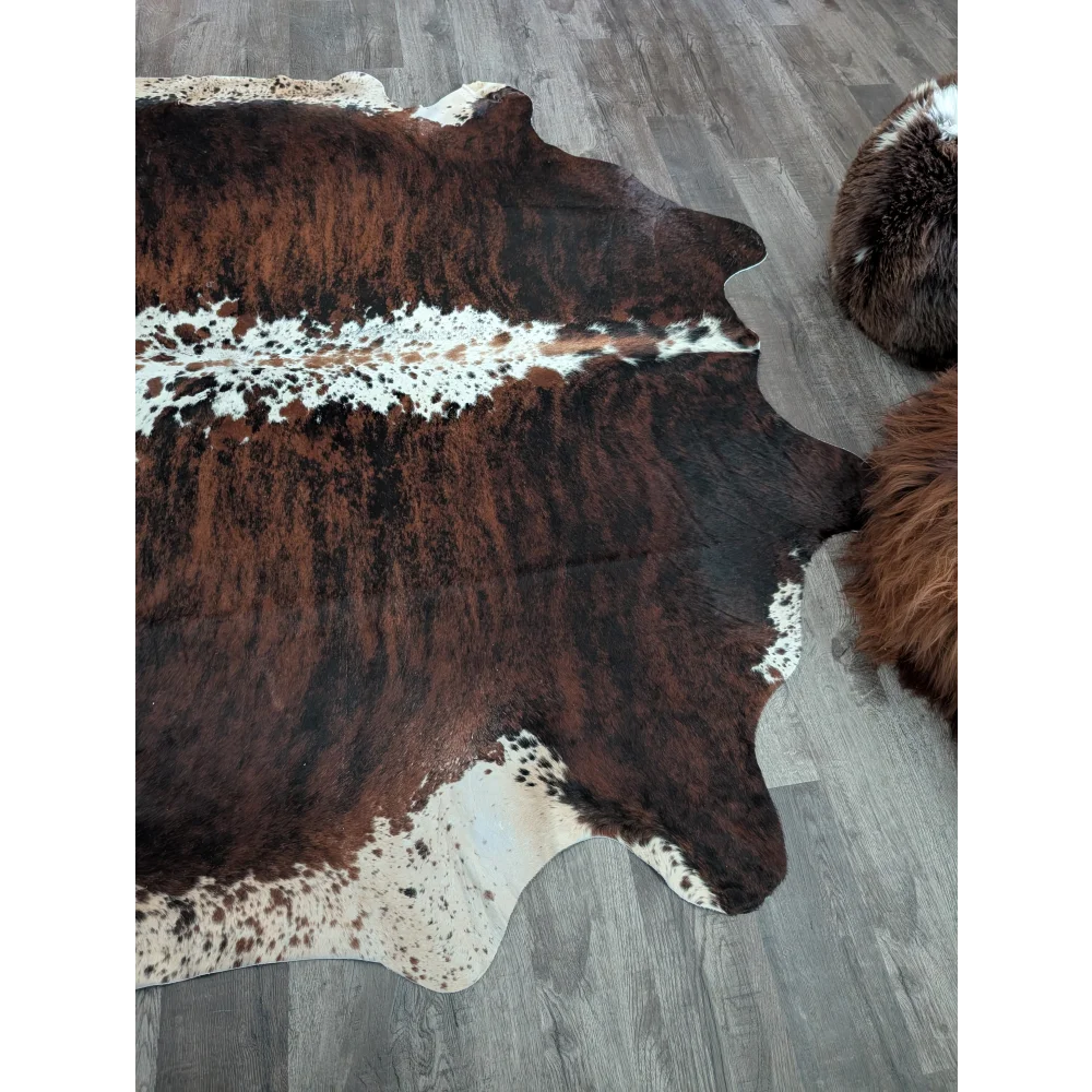 Extra large cowhide tricolour34 rug in brown and white with natural irregular edges perfect for beautiful rugs