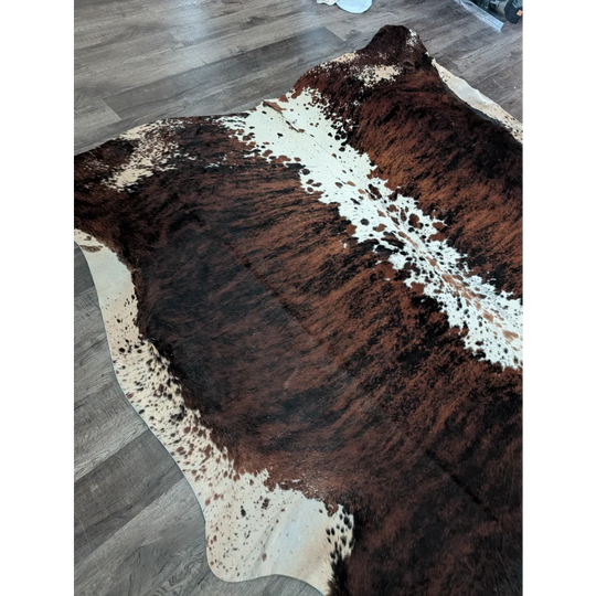 Brown and white extra large cowhide rug tricolour34 with natural fur texture perfect for beautiful rugs