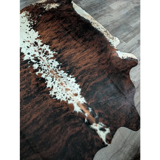 Brown and white tricolour 34 extra large cowhide rug with natural fur texture perfect for beautiful rugs and large cowhide fans