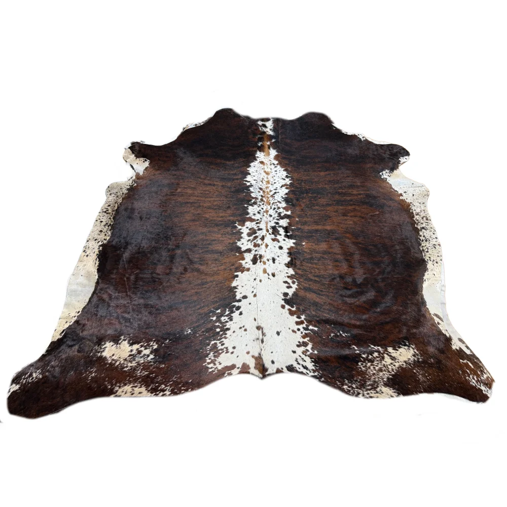 Brown and white extra large cowhide rug with natural irregular patterns perfect for beautiful rugs collection
