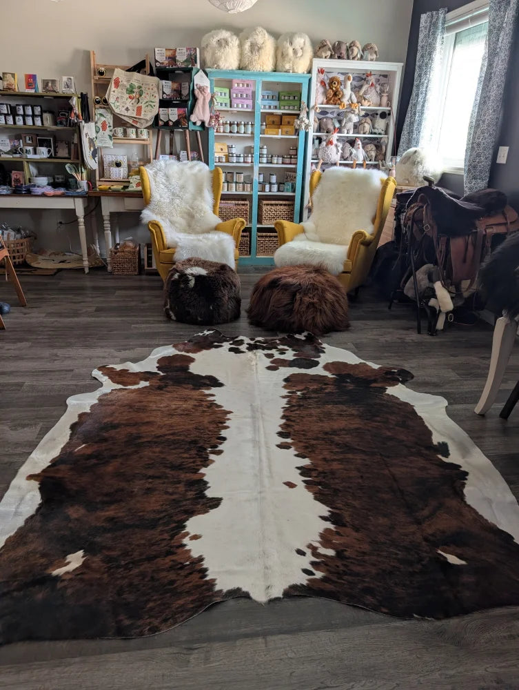 Tricolour#49 extra large cowhide rug with brown and white natural irregular patches measures 96 by 82 inches