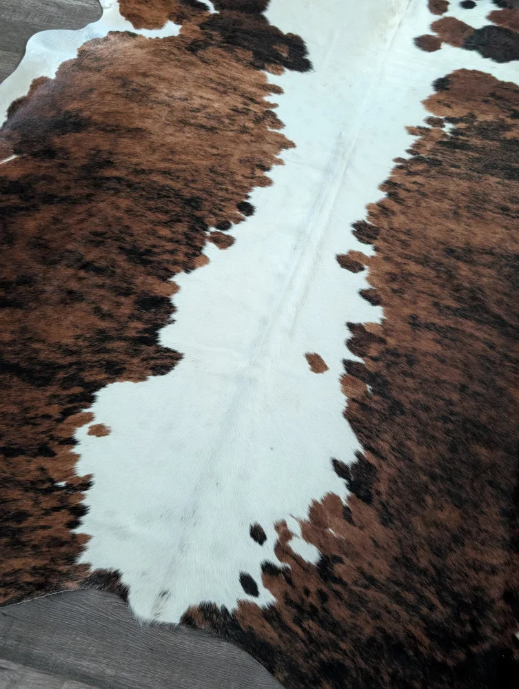 Brown and white tricolour#49 extra large cowhide rug with natural fur texture measuring 96 x 82 inches