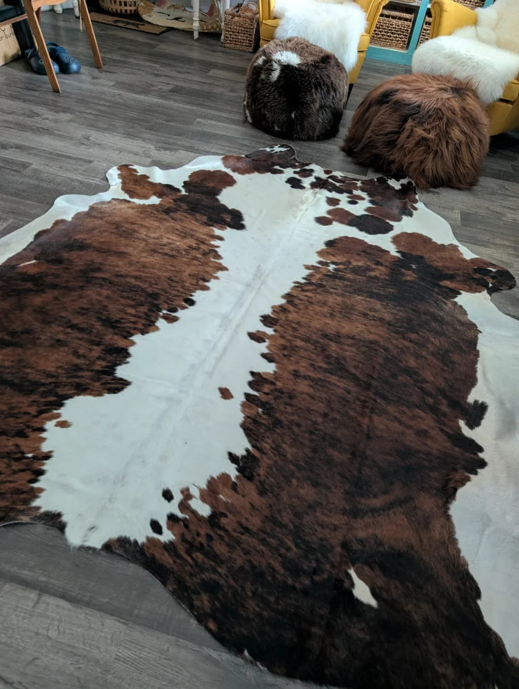 Extra large brown and white cowhide rug tricolour#49 with natural dark brown and black spots on soft textured surface