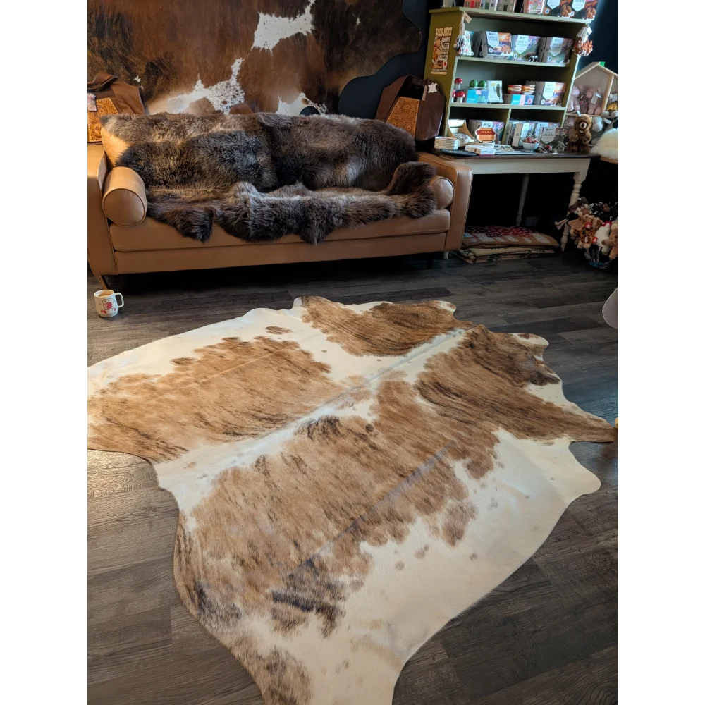 Brown and white extra large cowhide rug triColour553 with natural fur texture perfect for large spaces