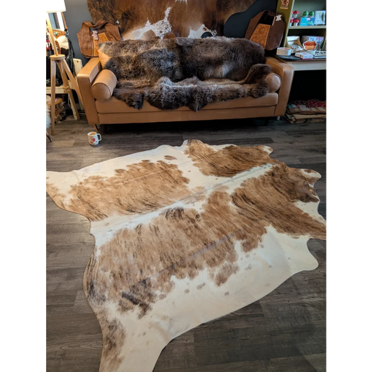 Extra large brown and white cowhide rug triColour553 with natural fur texture perfect as a large cowhide decor piece