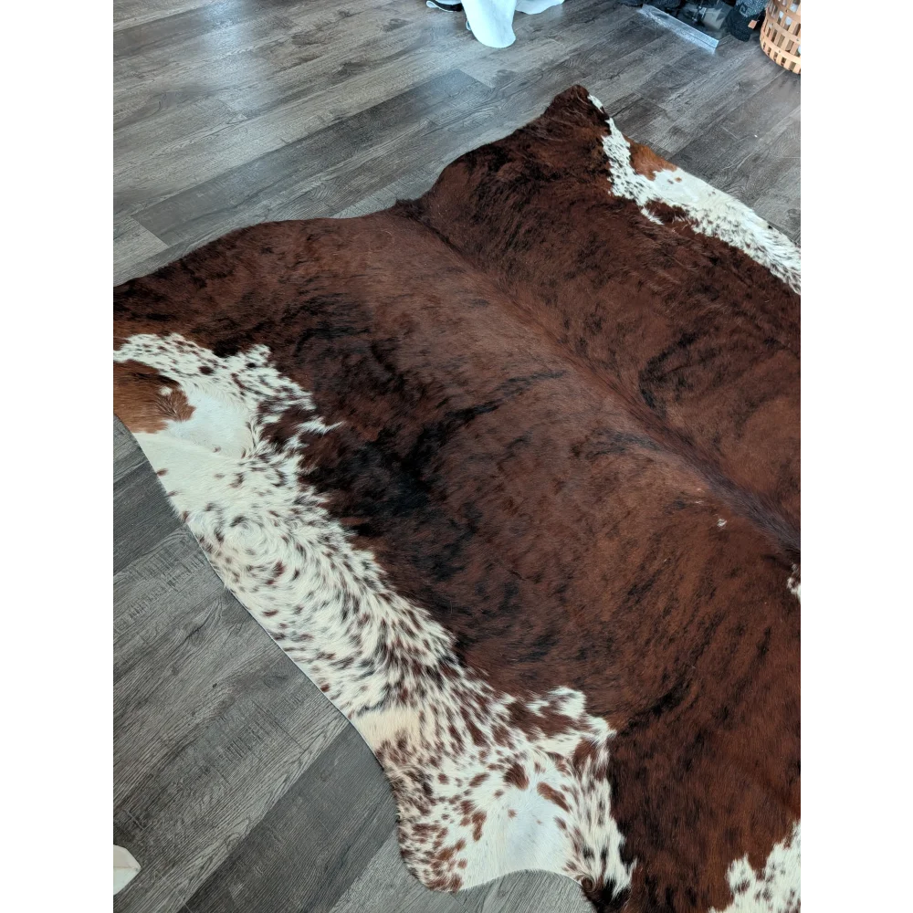 Brown and white tricolour extra large cowhide rug with natural fur texture perfect for beautiful rugs and decor