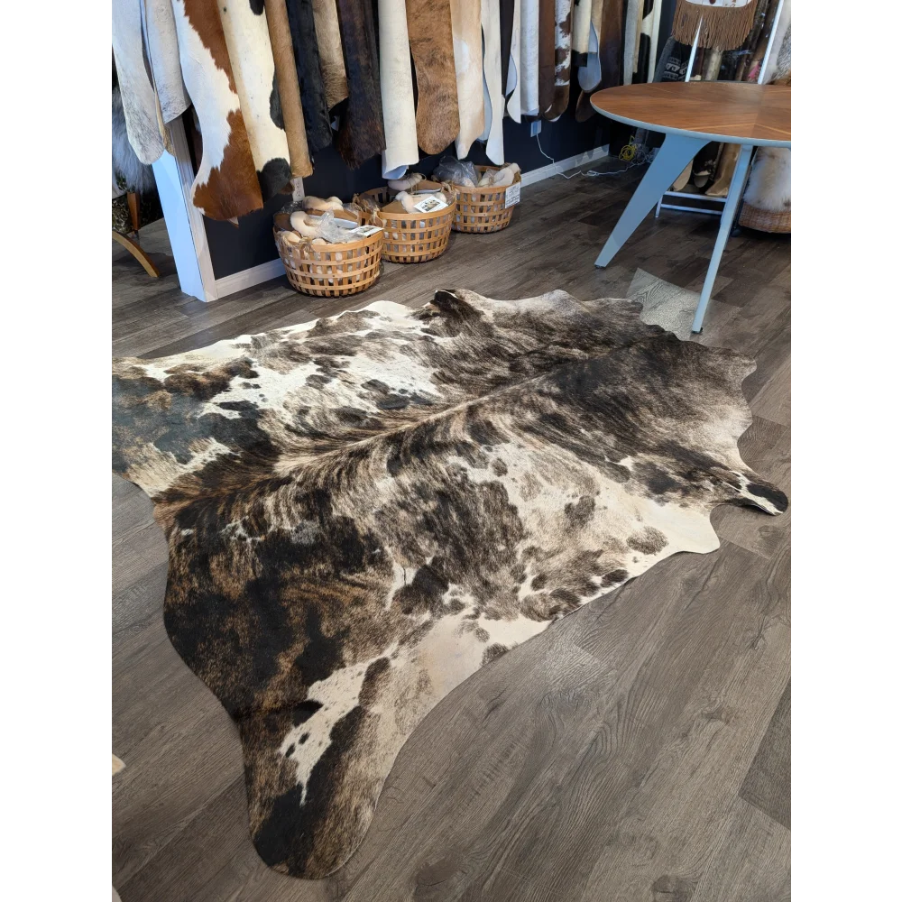 Extra large cowhide rug tricolour 95 features natural brown and white spotted pattern with rustic charm and unique characteristics