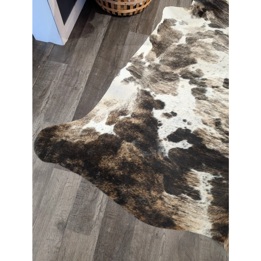 Brown and white extra large cowhide rug tricolour95 with natural fur texture and rustic charm unique characteristics