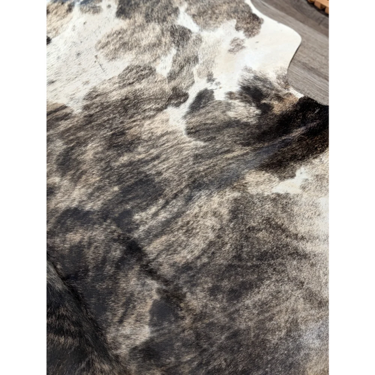 Extra large cowhide rug tricolour95 with black and white rustic charm and unique textured surface