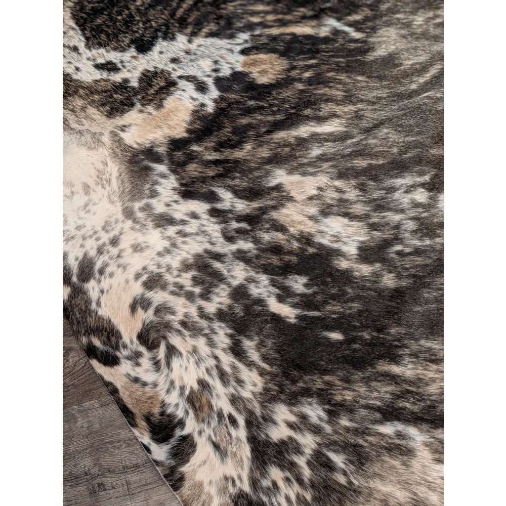 Extra large cowhide rug tricolour 99 with rustic charm and unique characteristics in black white and tan patches