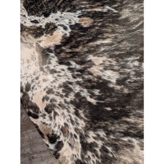 Extra large cowhide rug tricolour 99 with rustic charm and unique characteristics in black white and tan patches