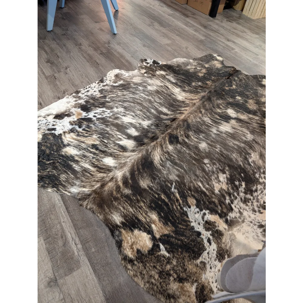 Extra large cowhide rug tricolour 99 with rustic charm and unique mottled black white and tan patches