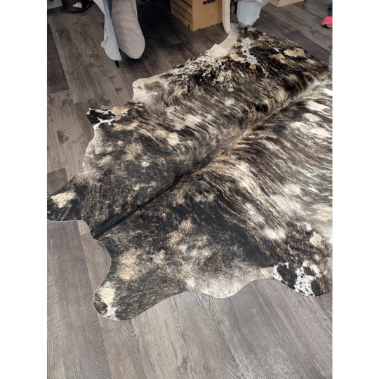 Tricolour 99 extra large cowhide rug with rustic charm featuring unique black white and tan mottled patches