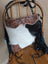 Tumbleweed 4 smoky charcoal black and white cowhide crossbody bag with hand tooled brown floral embroidery and zippered pocket