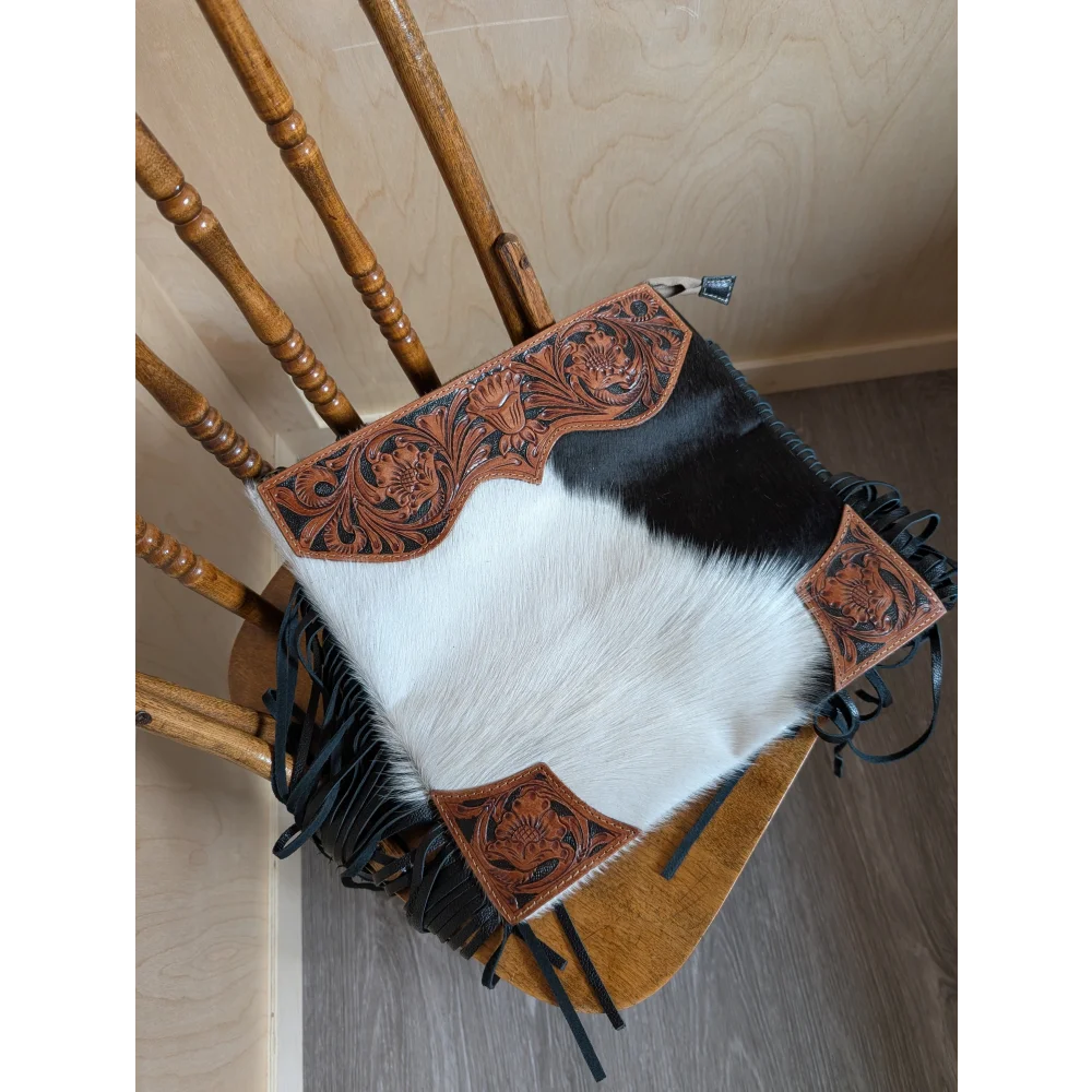 Tumbleweed 4 cowhide clutch with hand tooled brown floral embroidery black fringe and smoky charcoal zippered pocket