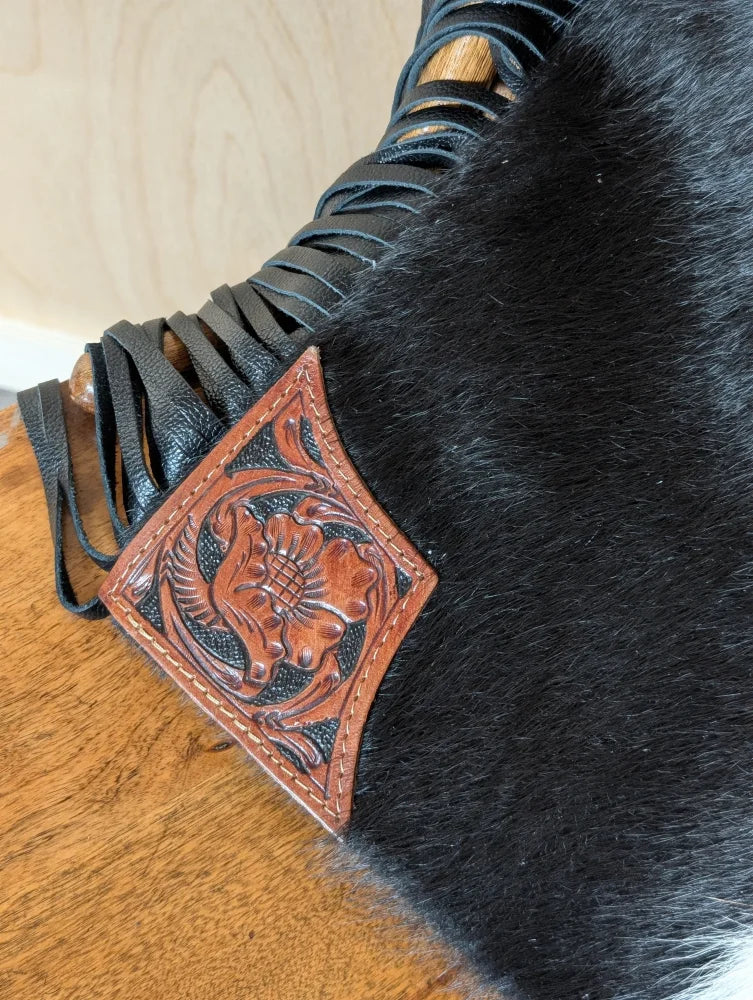 Tumbleweed 5 gorgeous tassel purse with hand tooled brown leather patch and black stitched edges on smoky charcoal boot