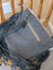 Tumbleweed 5 smoky charcoal denim crossbody bag with black leather fringe hand tooled zippered pocket and adjustable strap