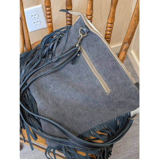 Tumbleweed 5 smoky charcoal denim crossbody bag with black leather fringe hand tooled zippered pocket and adjustable strap