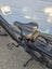 Comfortable sheepskin bicycle seat with black leather saddle, gel padding, and ergonomic design