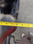 Yellow tape measure on merino sheepskin bicycle seat cover