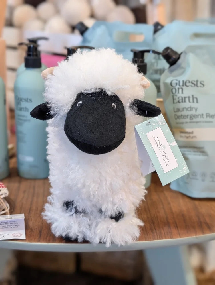 Valentina the valais sheep plush toy by nana huchy with soft fluffy white and black woolly fur