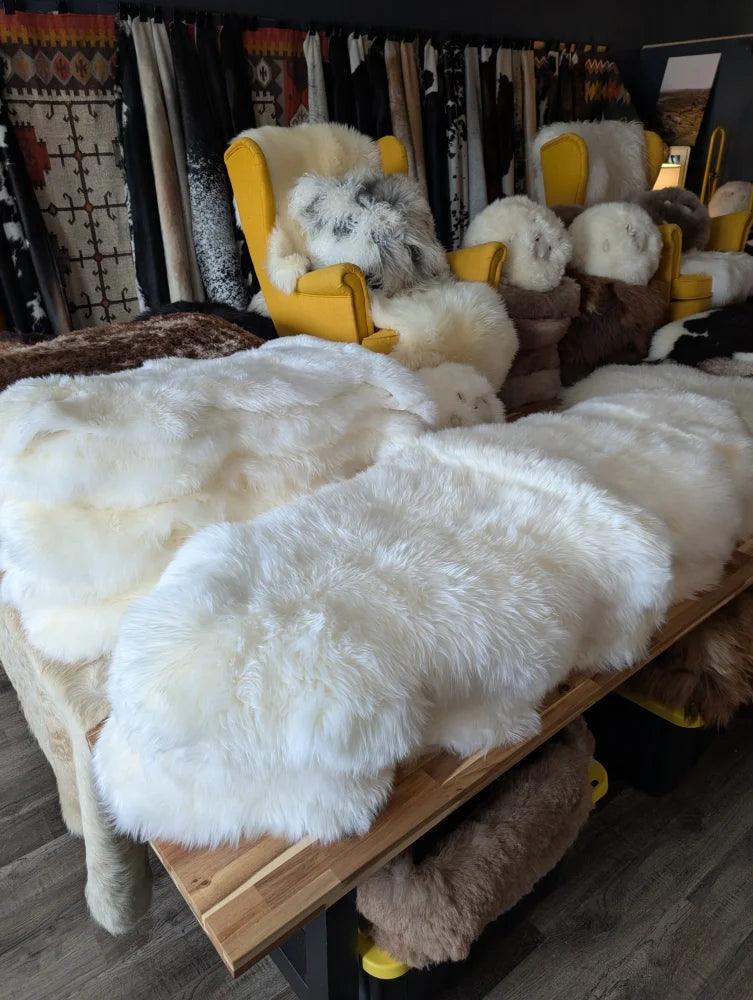 Oeko tex certified very soft merino double sheepskin rug on wood table