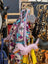 Violet dachshund bag charm in pink leather with orange accents, yellow tassels by Angus Oliver