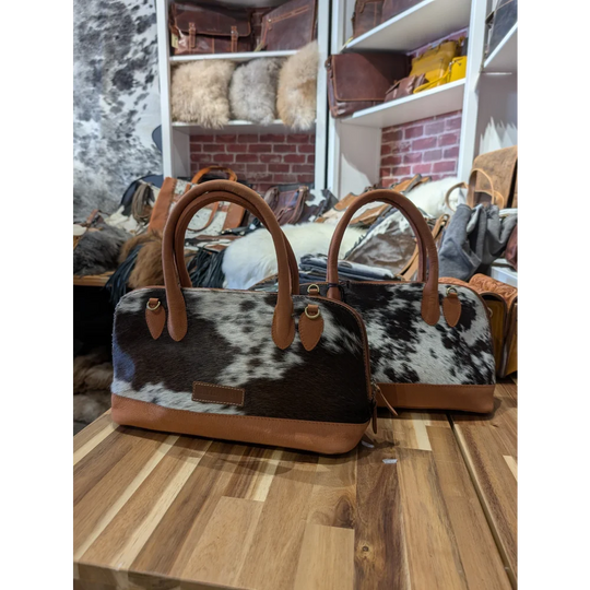 Westward Hair-on Hide Leather satchels with angus oliver cowhide pattern