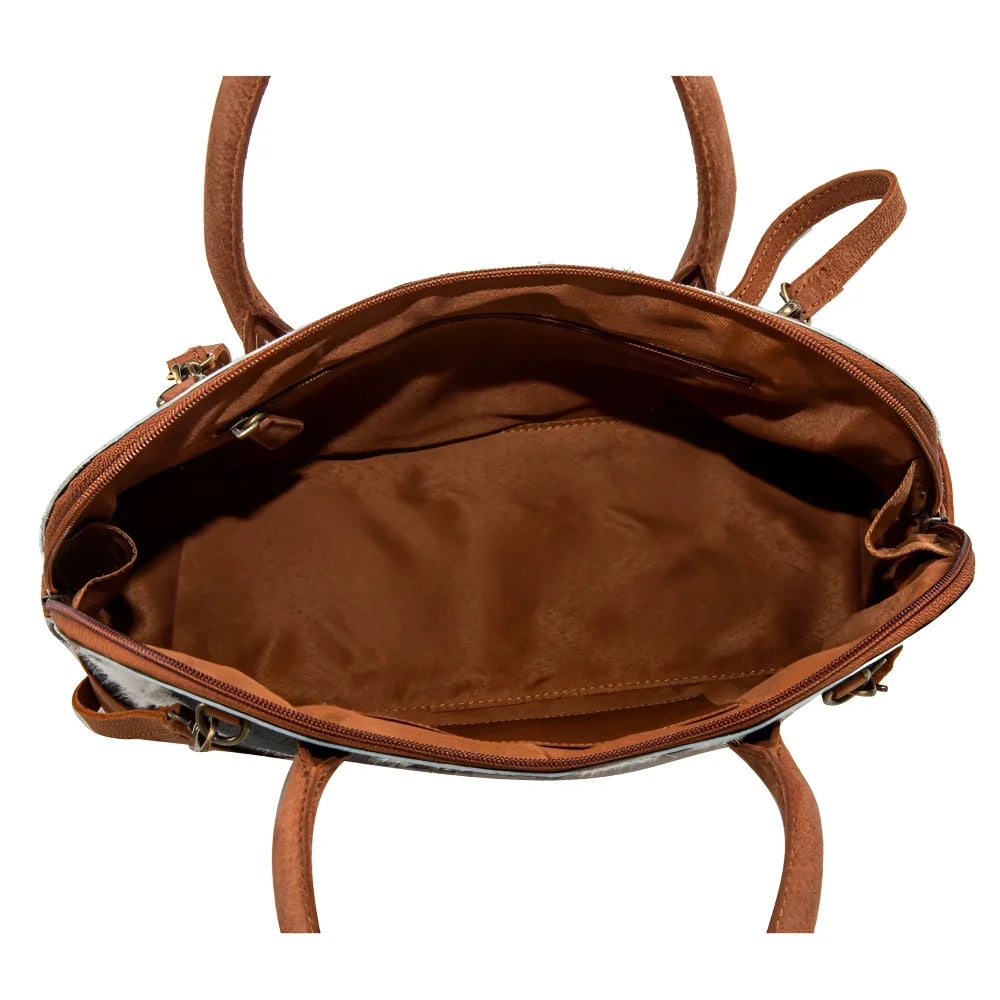 Westward hair-on hide leather bag by Angus Oliver, brown cowhide pattern