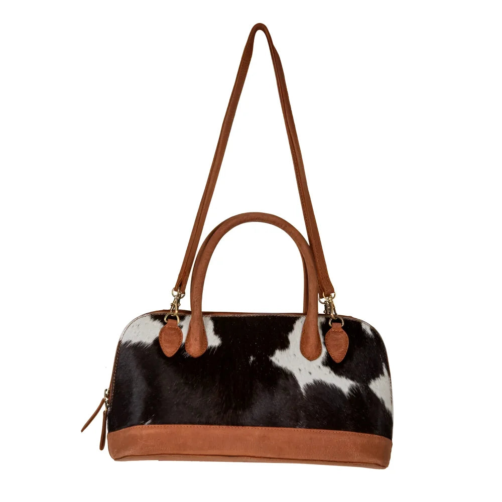 Stylish black white hair-on hide Angus Oliver cowhide bag with tan trim