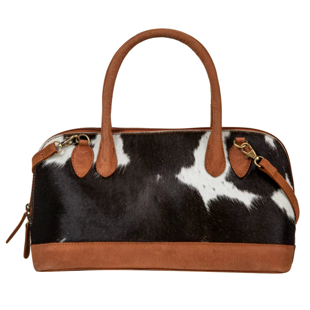 Westward hair-on hide Angus Oliver cowhide bag with tan leather handles