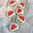 White mushroom trio dryer balls with felted red caps dotted in white and green grassy bases by angus oliver