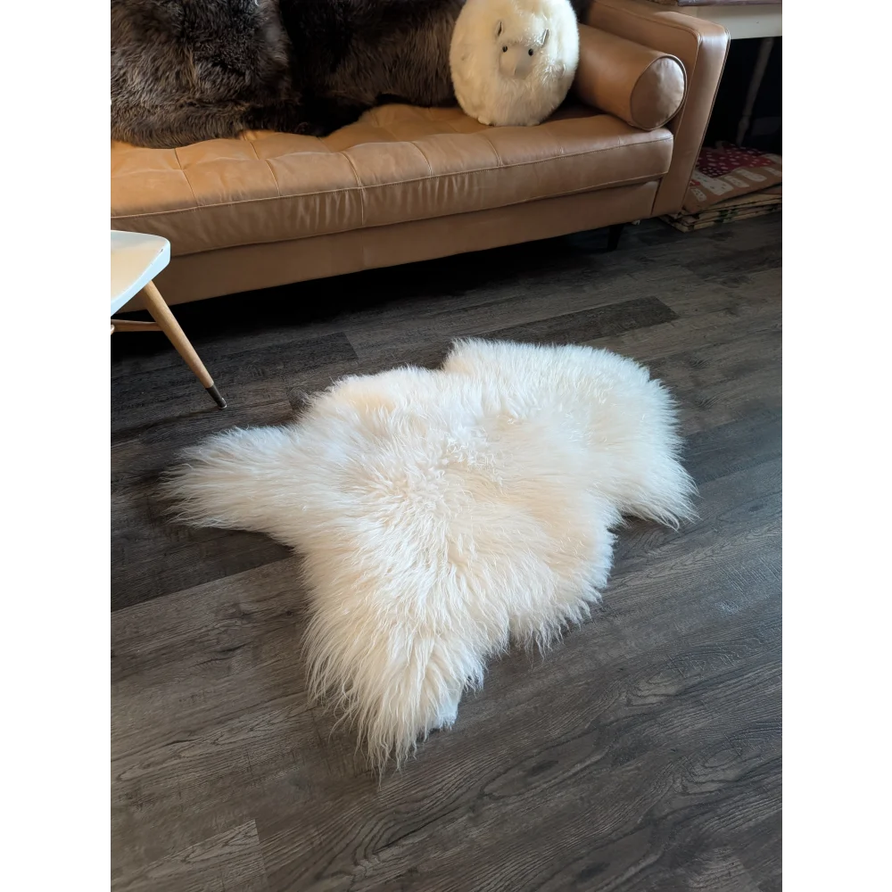 White fluffy soft icelandic sheepskin rug 48 x 32 inches natural irregular shape grade a fur