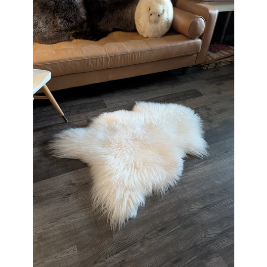 White fluffy soft icelandic sheepskin rug 48 x 32 inches natural irregular shape grade a fur