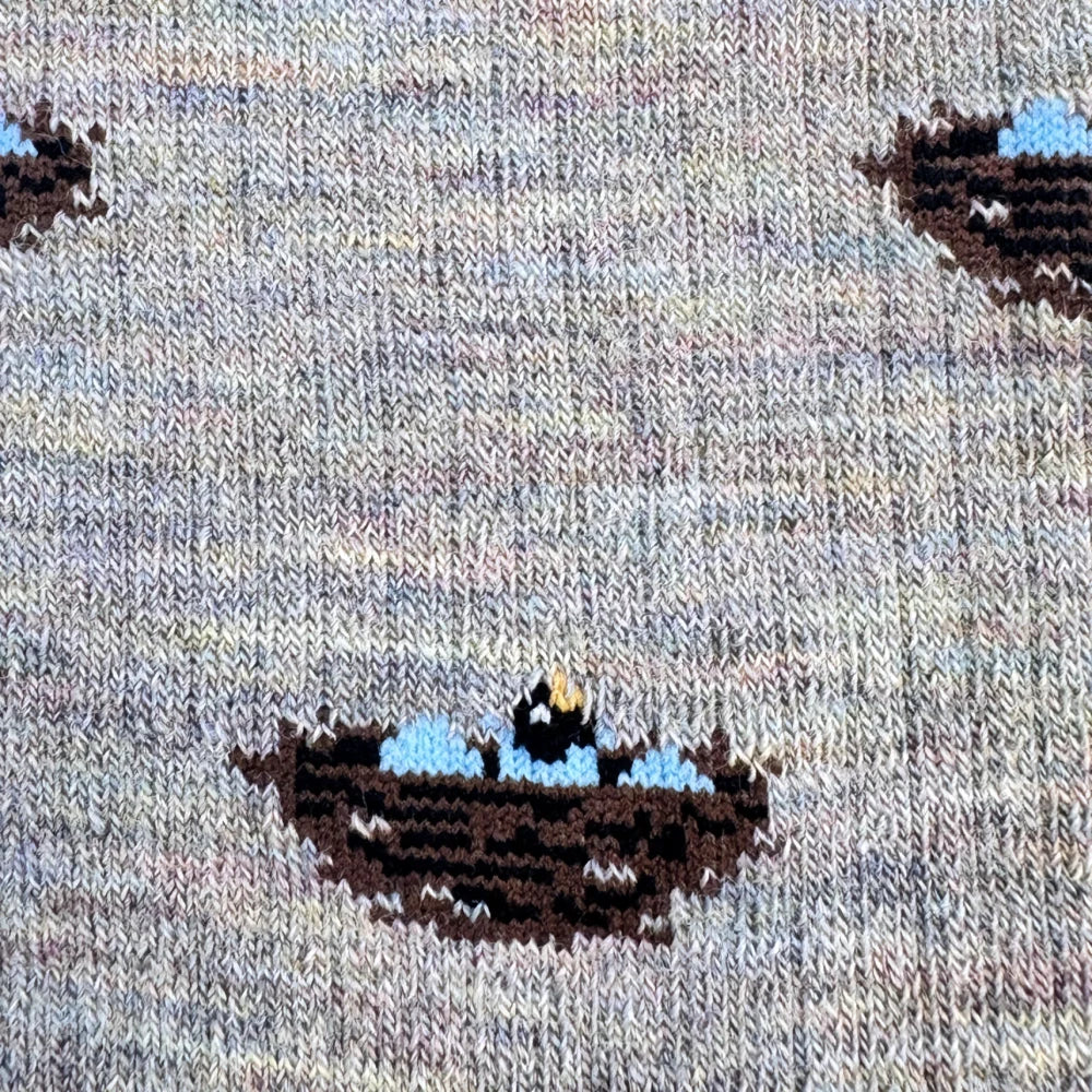 Women’s merino wool socks with gray knit and brown blue black embroidered boat pattern perfect for outdoor fun
