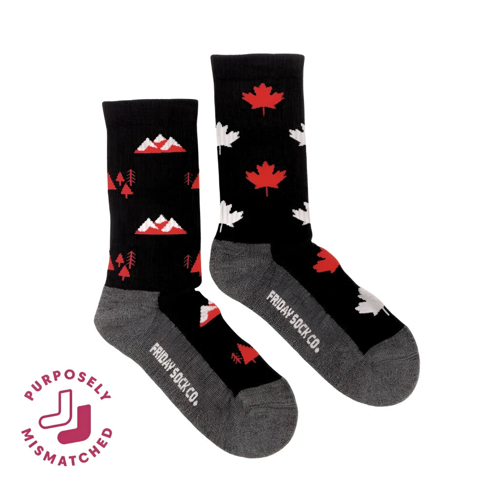 Women’s canada merino wool socks with red and white maple leaf patterns, gray heel and toe for warm hiking trails