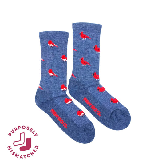 Blue merino wool socks with playful red cardinal birds featuring soft premium wool for women